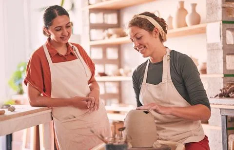 Pottery wheel, workshop and talking women doing sculpture design mold, studio Stock Photos