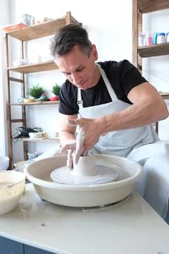 Pottery Workshop, Man Potter Makes A Pitcher Out Of Clay, Handicraft, Production Stock Photos
