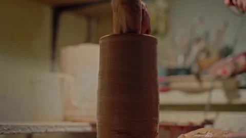 Pottery workshop. Old man potter professionally creates perfect form and shape Stock Footage 258800888