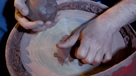 Pottery workshop, potter's wheel, close up, male hands Stock Footage 67882062