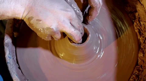 Pottery workshop, potter's wheel, close up, male hands Stock Footage 67882092