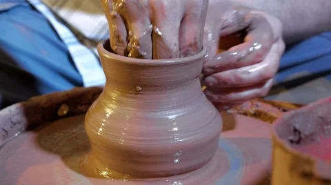 Pottery workshop, potter's wheel, close up, male hands Stock Footage 67882140