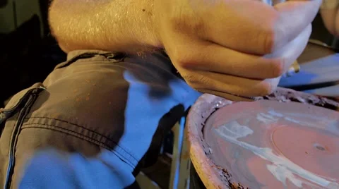 Pottery workshop, potter's wheel, close up, male hands, pan, slowmo Stock Footage 67882164