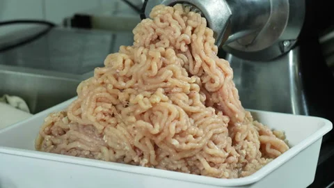 Poultry grind minced in a food processor, close-up shot Stock Footage 100681787