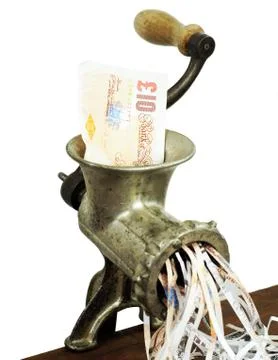 Pound note in a meat grinder Stock Photos