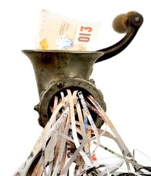 Pound note in a meat grinder Stock Photos