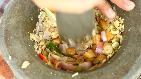 Pounding  herb to make curry, Thai food Stock Footage 89572856