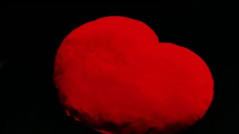 Pounding pillow heart Stock Footage 78161636