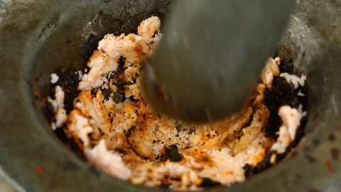 Pounding  shrimps with chili paste in  mortar Stock Footage 94097769