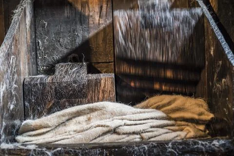 Pounding wool using a water driven mill wheel, Sarbi, Maramures, Romania Stock Photos