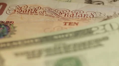 Pounds versus Dollars Stock Footage 10608742