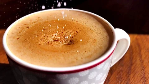 Pour and mix the sugar in a small cup of coffee Stock Footage 71619096
