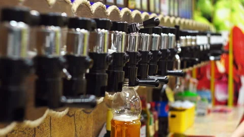 Pour beer in the store Stock Footage 85895085