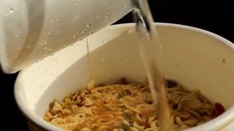 Pour boiling water auto quick-cook instant noodles mixed with dry vegetables Stock Footage 270946205