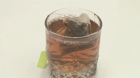 Pour boiling water over the tea bag. Stock Footage 22732882