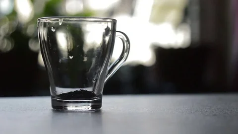 Pour boiling water over the tea leaves Stock Footage 73640283