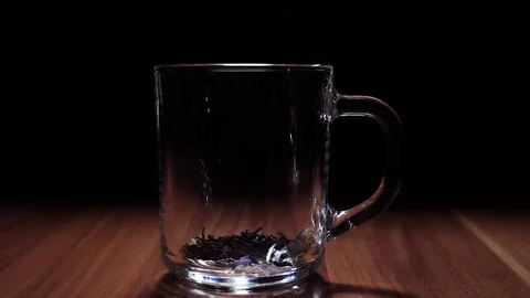 Pour Boiling Water Over Tea Leaves 1 Stock Footage 75929678
