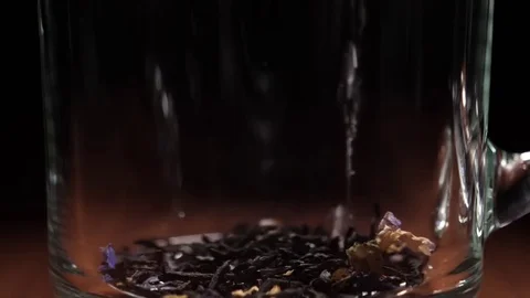 Pour Boiling Water Over Tea Leaves 2 Stock Footage 75930005