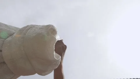 Pour the buckwheat out of the bag, bottom view Stock Footage 133196653