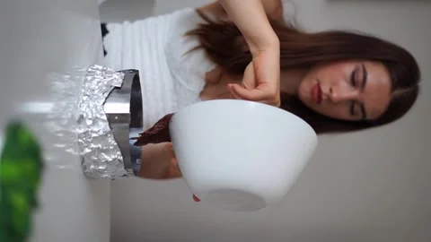 Pour into cake mold vertical video Video stock 245685229