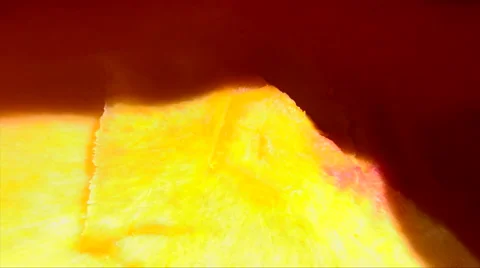 Pour candy into a pumpkin, close up Stock Footage 67724920