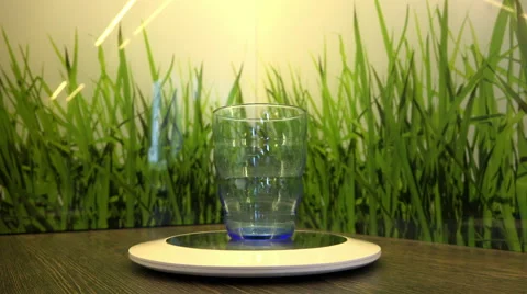 Pour cereal in a transparent glass standing on the scales Stock Footage 59143451