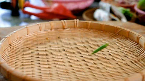 Pour the chili in to the basket in kitchen to prepare some food Stock Footage 100701330