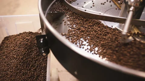 Pour coffee beans after roasting. Close-up Stock Footage 58957540