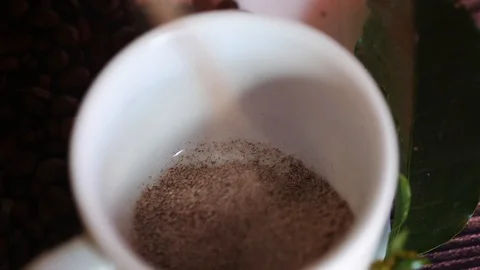 Pour the coffee into the cup. Stock Footage 104095950