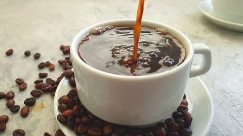 Pour coffee into a cup Video stock 117412035