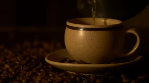 Pour coffee into a cup slow motion Stock Footage 59329242