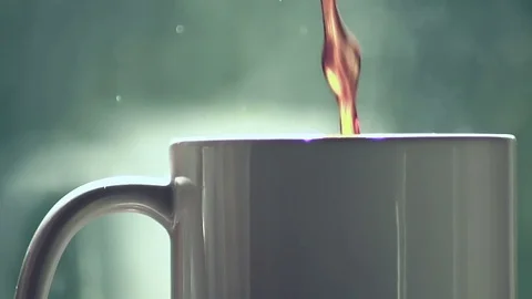Pour coffee into a white mug. Stock Footage 75819342