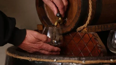 Pour cognac into a glass Video stock 325853329
