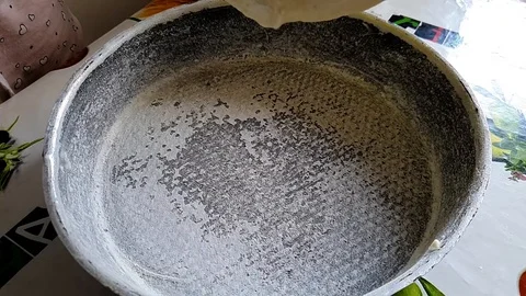 Pour the cream into the cake tin Stock Footage 129303004