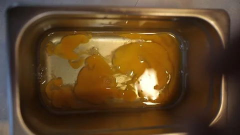Pour the egg into the pan 1 Video stock 311762968