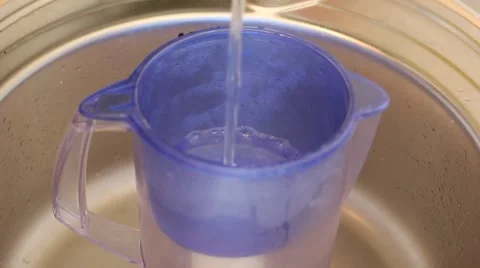 Pour the filter with fresh water Stock Footage 41380490