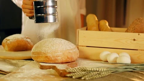 Pour the flour to bread in slow motion Stock Footage 72658139