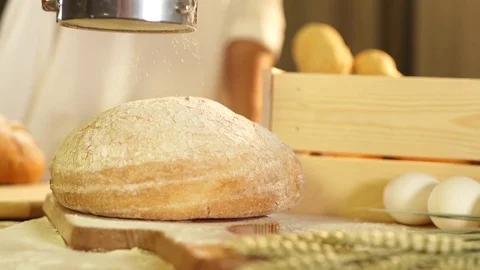 Pour the flour on bread in slow motion Stock Footage 72658162