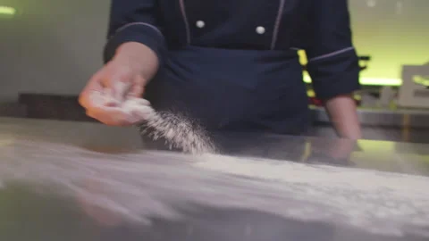 Pour flour in kitchen Stock-Footage 138581676