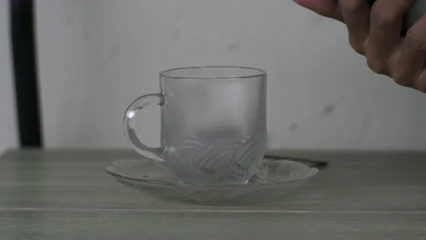 Pour Hot Water into a Tea Cup Stock Footage 127268505