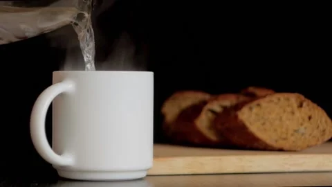 Pouring Hot Water into a Coffee Cup Stock Video - Video of shiny, motion:  61664771