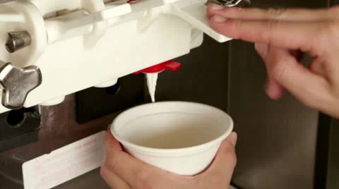 Pour ice cream to a cup Stock-Footage 23533754