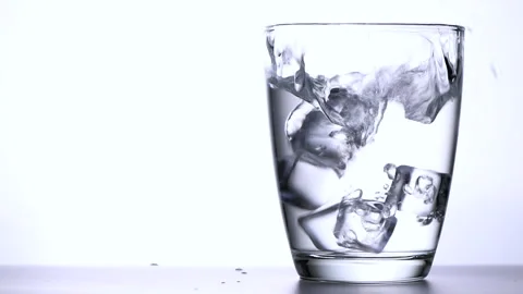 Pour ice cube into water isolated on white background, Stock Footage 161108998
