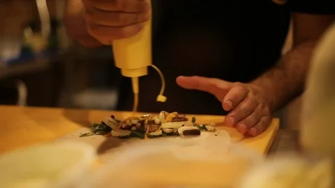 Pour Icing over the Octopus Stock Footage 86246103