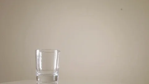 Pour milk from a bottle Stock Footage 73386025