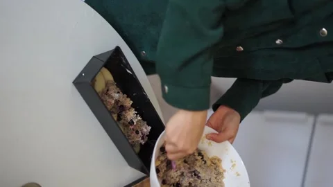 Pour the mixture into the mold vertical video Stock Footage 258416383