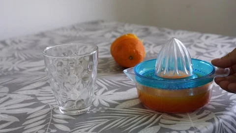 Pour the orange juice Stock Footage 129611866