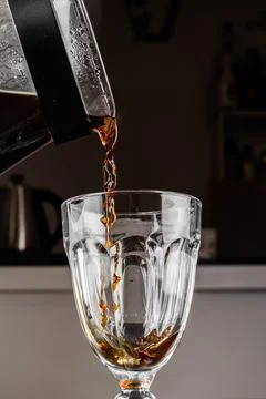 Pour-over alternative method of making coffee. Filter coffee brewing on black Stock Photos