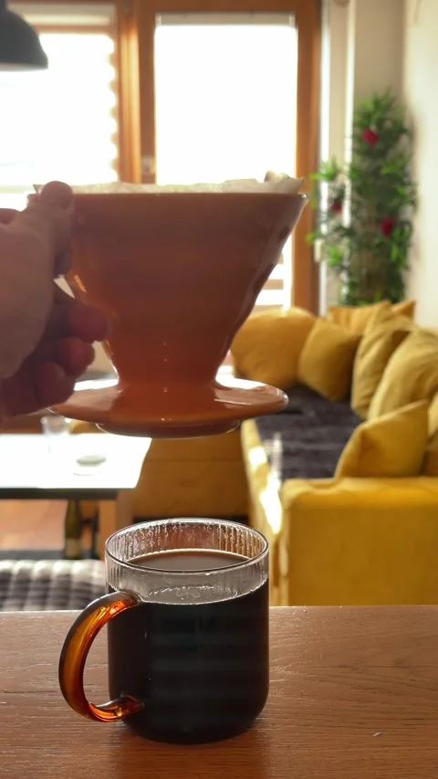 Pour Over Coffee Brewing at Home in Cozy Sunlit Living Room Video stock 335811406