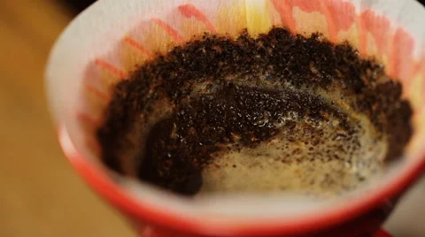Pour over coffee brewing method whole process. Coffee flows through the filter Stock Footage 62313760